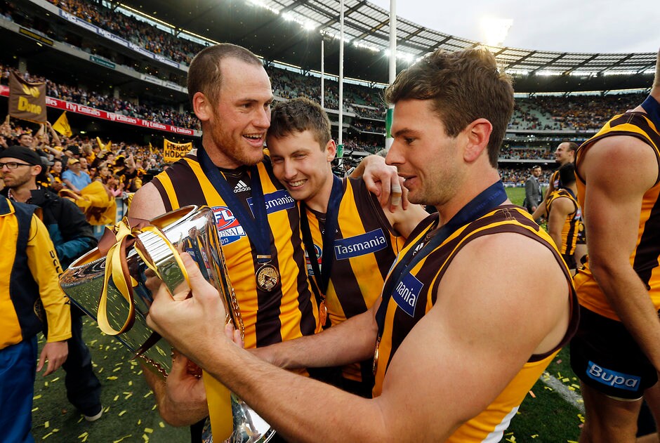 AFL 2013 Toyota Grand Final - Hawthorn v Fremantle Jonathan Simpkin with Jarryd Roughead and Liam Shiels after the 2013 Grand Final - ${keywords}